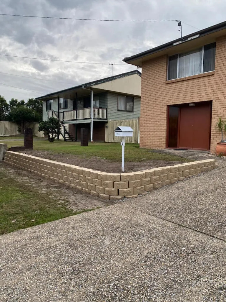 Low block retaining wall in a front yard