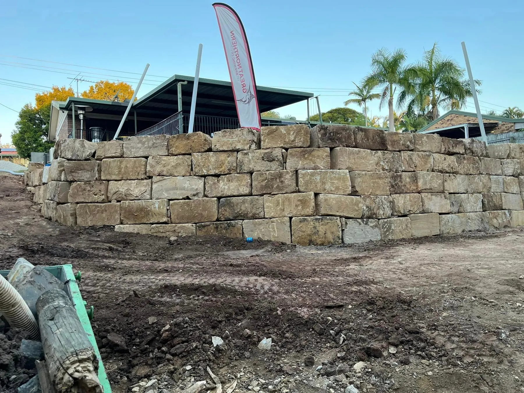 Wide sandstone block retaining wall